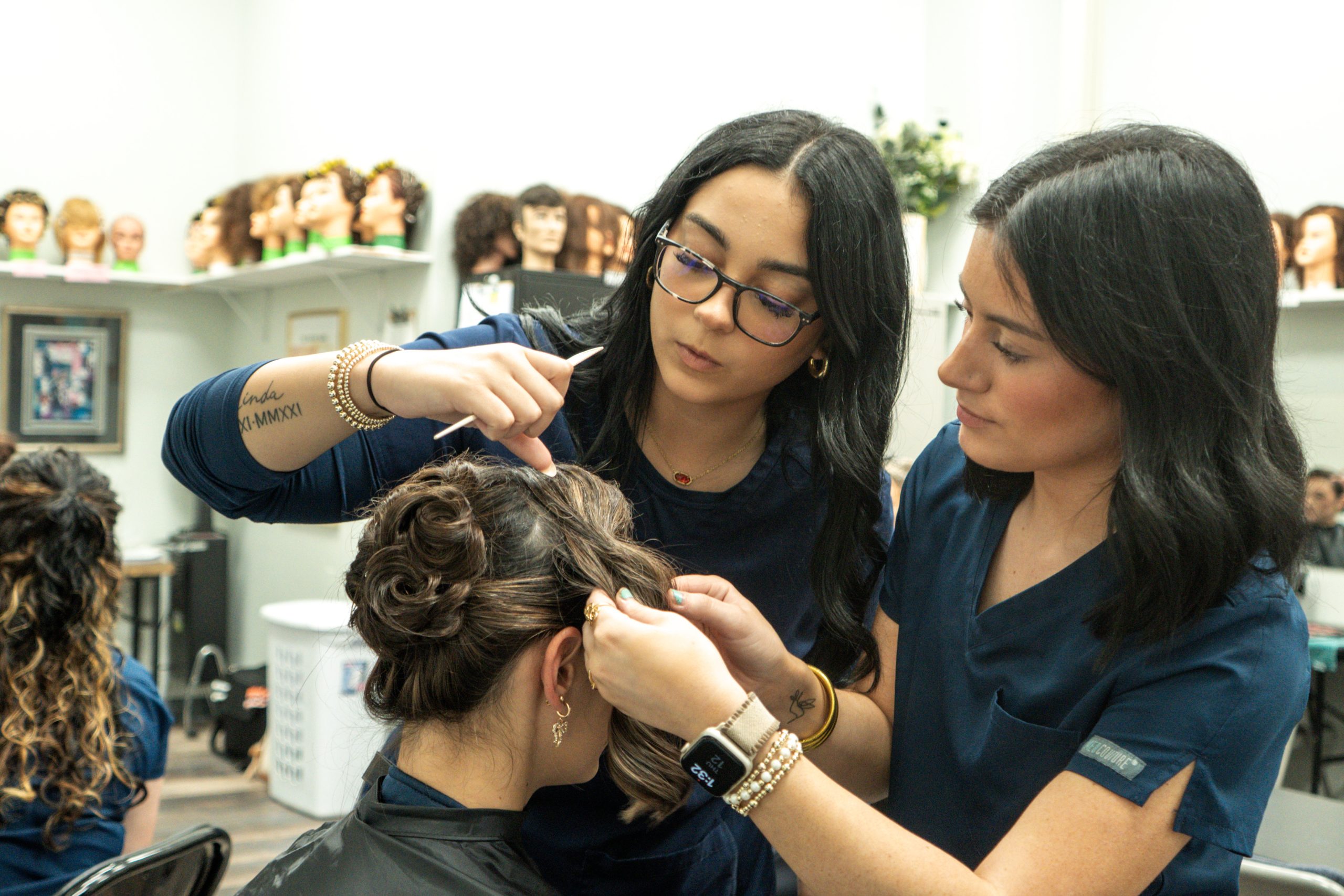 Group of stylists around a client